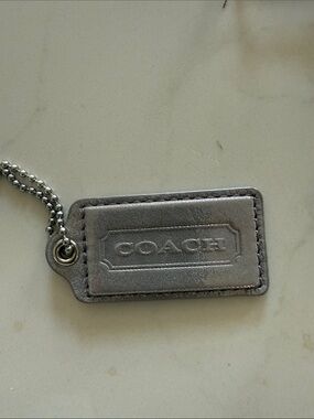 Coach Hang Tag